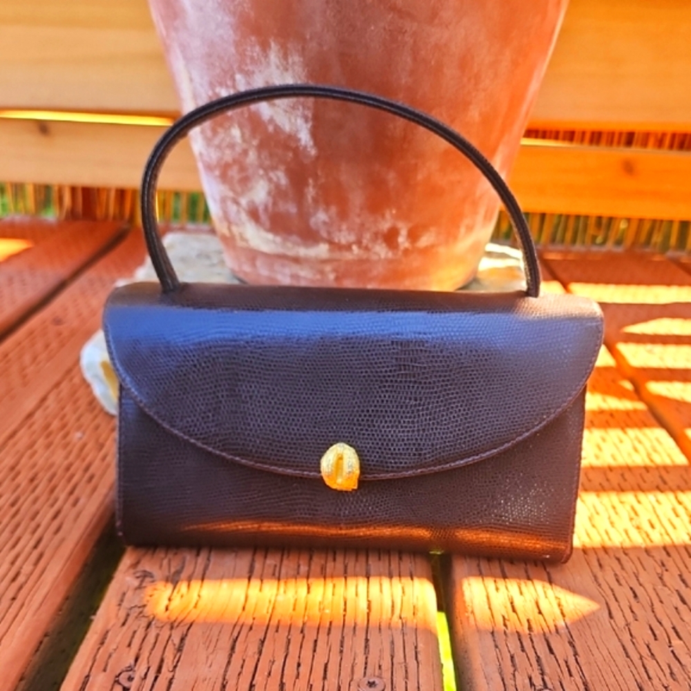 Sophisticated Brown Leather Wristlet with Gold Clasp